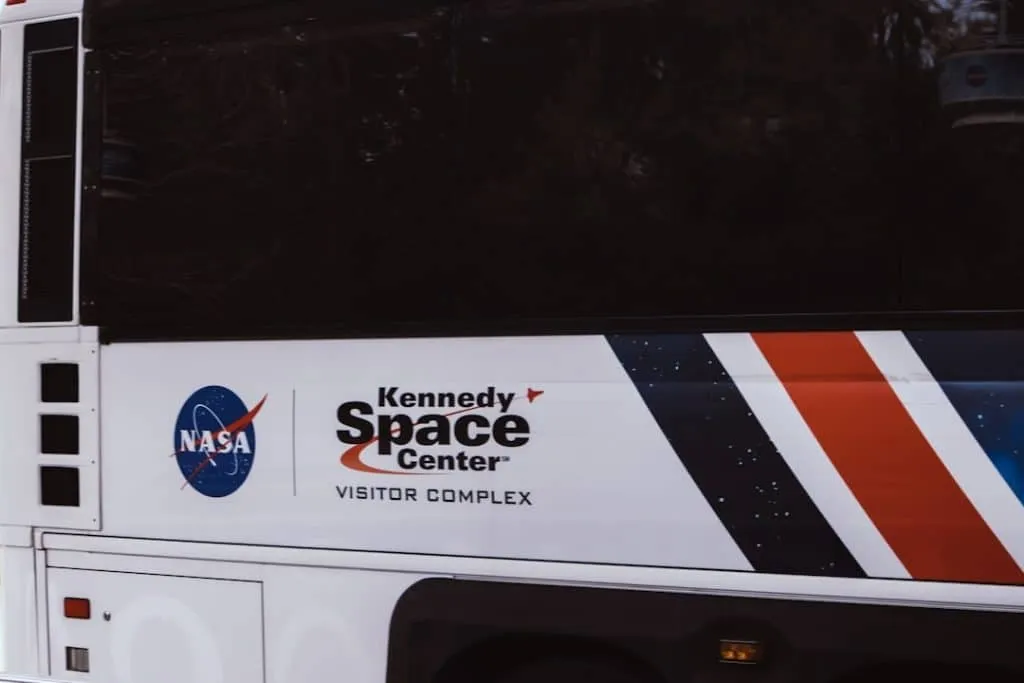 A bus with a NASA logo and 