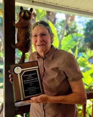Dr. Sayre with her Lifetime Achievement Award