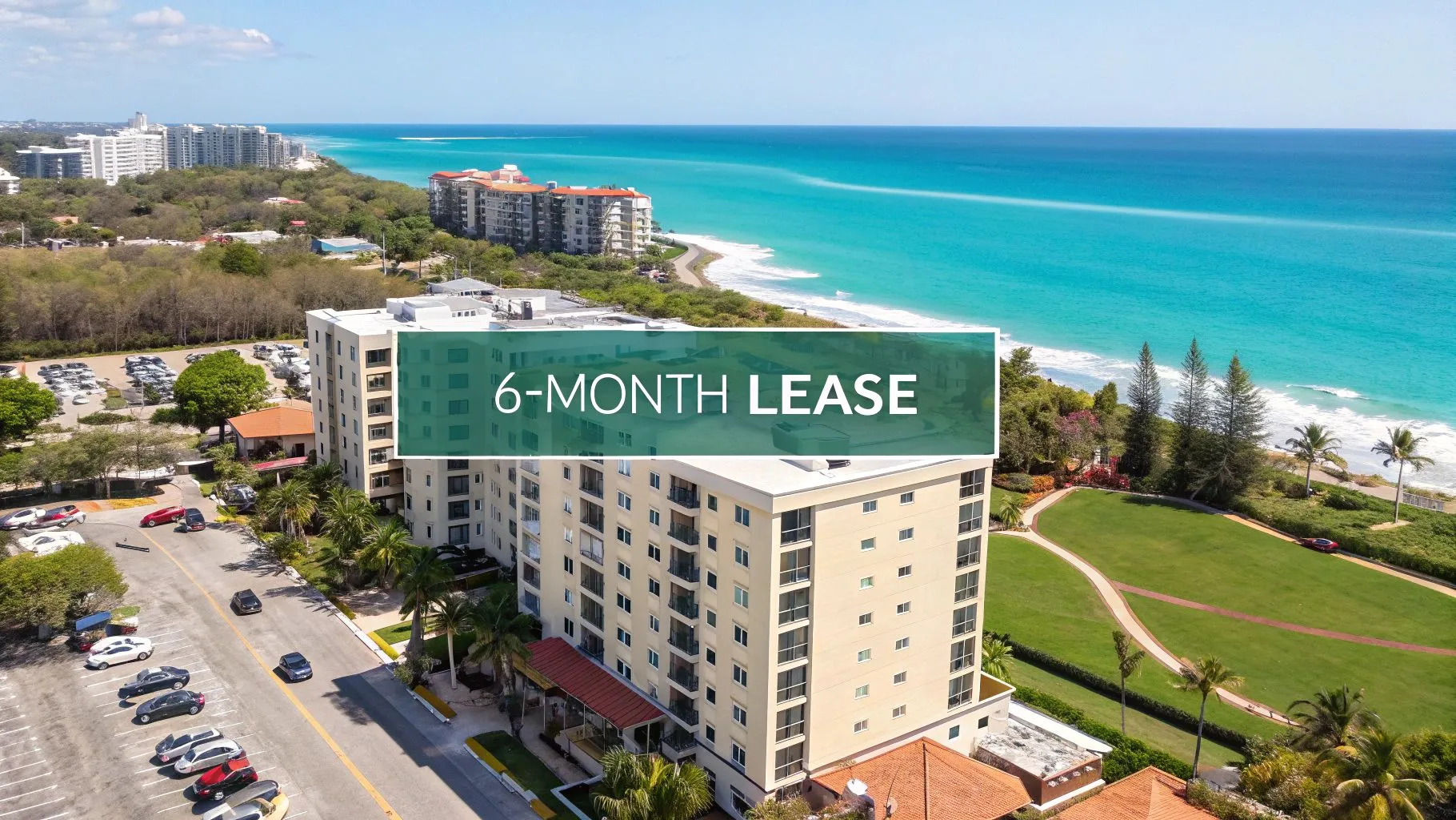 Aerial view of beachfront apartment buildings next to turquoise ocean water, with a banner overlay reading
